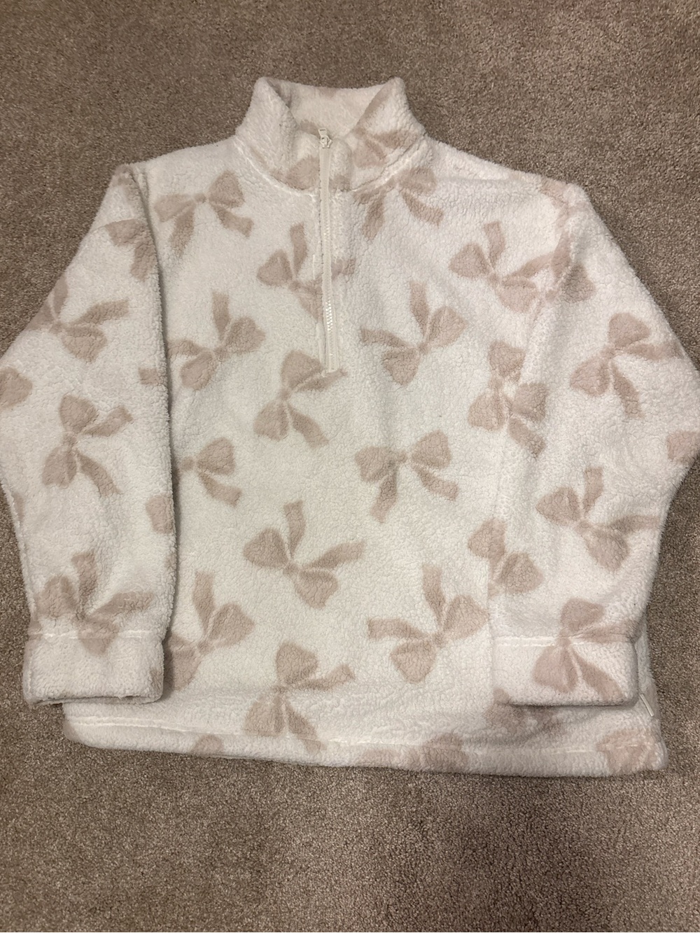 Cozy Cream Mock Neck Fleece with Bow Print